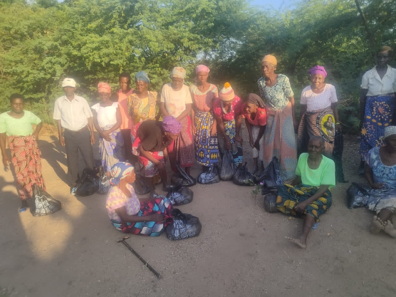 Community members receiving startup kits