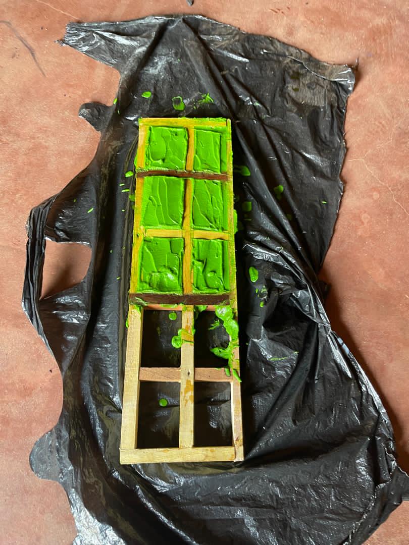 Soap being set in wooden moulds during training